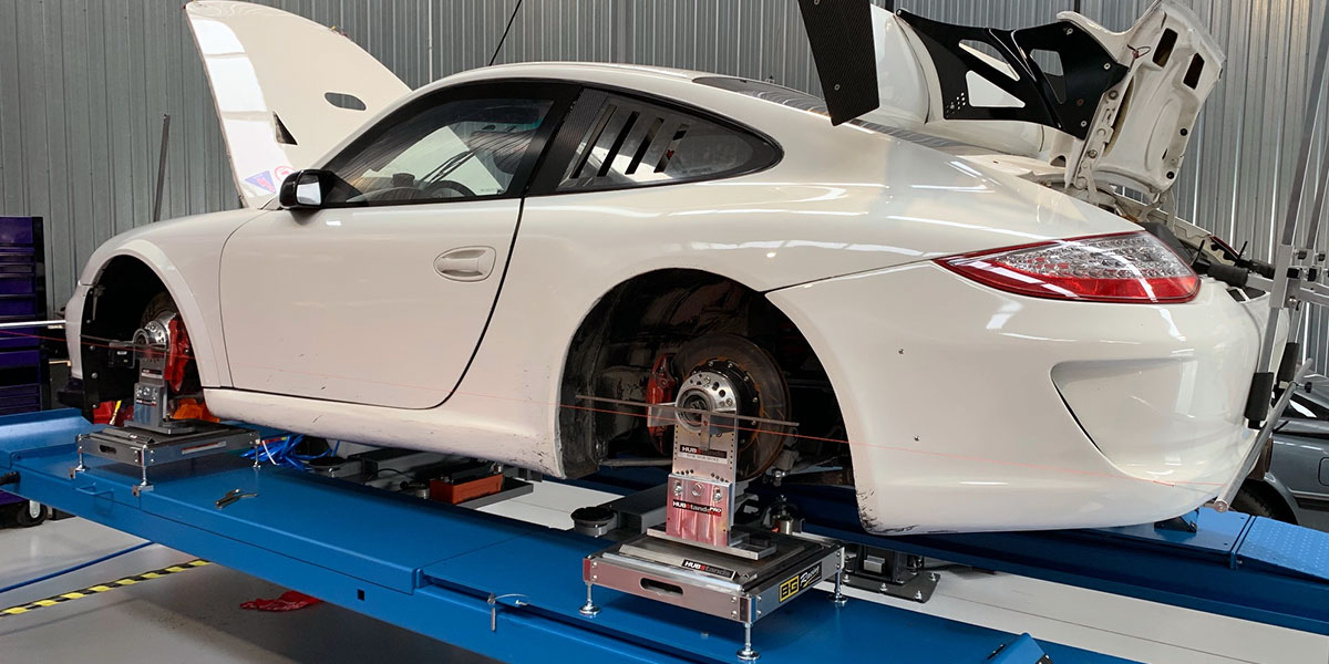 ProPLUS HUBStands brand hub stands and alignment equipment on a Porsche GT 3 Cup